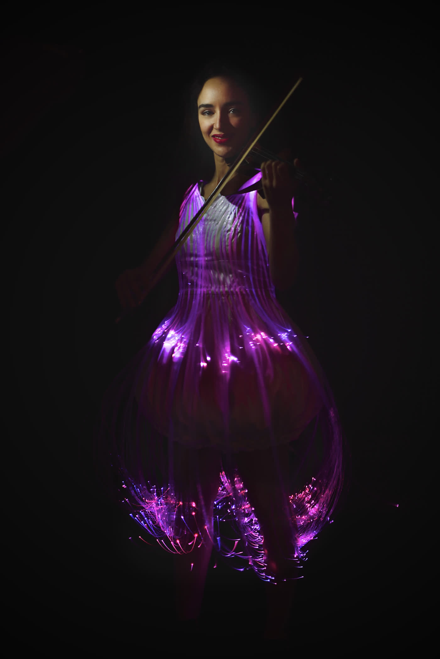 Sadie in her couture light dress, magenta mode